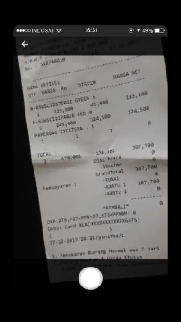 Retailer photographing a purchase receipt to earn loyalty points